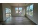 Bright dining area with sliding glass door and large windows at 107 Willow Cameron Way, Angier, NC 27501
