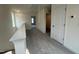 Upstairs hallway with carpet and white trim at 107 Willow Cameron Way, Angier, NC 27501