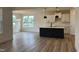 Open-concept kitchen with a center island, perfect for entertaining at 107 Willow Cameron Way, Angier, NC 27501