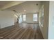 Spacious living room with hardwood floors and ample natural light at 107 Willow Cameron Way, Angier, NC 27501