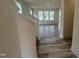 Open-concept living space with abundant natural light and modern flooring at 107 Willow Cameron Way, Angier, NC 27501