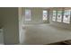 Spacious living room with many windows, allowing for lots of natural light at 107 Willow Cameron Way, Angier, NC 27501