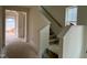 Staircase with white risers and handrail, and wooden stairs at 107 Willow Cameron Way, Angier, NC 27501