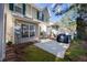 View of the backyard with a small concrete patio and grill at 11213 Presidio Dr, Raleigh, NC 27617