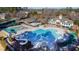 Aerial view of the community pool, playground, and clubhouse at 11213 Presidio Dr, Raleigh, NC 27617