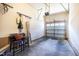 View of the empty garage with room for parking and storage at 11213 Presidio Dr, Raleigh, NC 27617