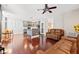 Open-concept living space with modern kitchen and hardwood floors at 11213 Presidio Dr, Raleigh, NC 27617