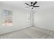 This bright bedroom features double windows, and light-colored carpet at 11705 Appaloosa E, Raleigh, NC 27613