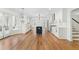 Gourmet kitchen featuring custom cabinets, stainless appliances, and a large island with a view to the backyard at 11705 Appaloosa E, Raleigh, NC 27613