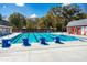 Community pool with multiple swim lanes, pool deck, and shaded seating at 11705 Appaloosa E, Raleigh, NC 27613