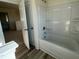 Bathroom with a tub and shower combination at 135 Willow Cameron Way, Angier, NC 27501