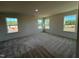 Bedroom with neutral carpet and multiple windows at 135 Willow Cameron Way, Angier, NC 27501