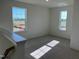 Upstairs bedroom with two windows and neutral carpet at 135 Willow Cameron Way, Angier, NC 27501