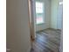 Well-lit foyer features hardwood floors, a window, and a view of the outdoors at 135 Willow Cameron Way, Angier, NC 27501