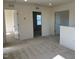 Upstairs loft with neutral carpet and doors leading to bedrooms at 135 Willow Cameron Way, Angier, NC 27501