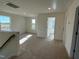 Upstairs loft with windows and doors leading to bedrooms at 135 Willow Cameron Way, Angier, NC 27501