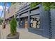 Charming storefront 'Thanks a Latte' with inviting window displays, enhancing the street's appeal in Angier, North Carolina at 135 Willow Cameron Way, Angier, NC 27501