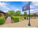 Scenic view of Angier, North Carolina's town square featuring a town sign, landscaped greenery, and charming architecture at 135 Willow Cameron Way, Angier, NC 27501