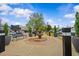 Beautiful town square with water feature, plantings, and ample pedestrian seating at 135 Willow Cameron Way, Angier, NC 27501