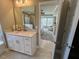 Stylish bathroom with a view into the bedroom, featuring a large vanity and ample counter space at 136 Willow Cameron Way, Angier, NC 27501