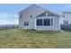 Well-maintained backyard with fenced perimeter, featuring a screened-in porch at 151 N Great White Way, Clayton, NC 27527