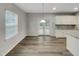 Dining area filled with natural light and featuring neutral colors and finishes at 151 N Great White Way, Clayton, NC 27527