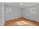 Bedroom with hardwood floors, natural light, and closet space at 1721 Fountain St, Rocky Mount, NC 27801