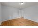 Bright bedroom with hardwood floors, complemented by fresh paint and neutral tones at 1721 Fountain St, Rocky Mount, NC 27801
