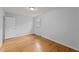 Bright bedroom features hardwood floors, a window, and neutral paint at 1721 Fountain St, Rocky Mount, NC 27801