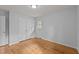 Cozy bedroom featuring closet space, natural light, and hardwood floors at 1721 Fountain St, Rocky Mount, NC 27801