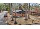 View of brick house with a cozy front porch, complimented by a well-maintained yard at 1721 Fountain St, Rocky Mount, NC 27801