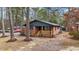 Charming brick home with a cozy front porch, enhanced by lush greenery and a welcoming entrance at 1721 Fountain St, Rocky Mount, NC 27801