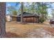 View of the brick house with an open carport showcasing classic charm at 1721 Fountain St, Rocky Mount, NC 27801
