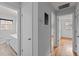 Hallway leading to a bathroom and bedroom, with hardwood floors at 1721 Fountain St, Rocky Mount, NC 27801