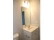 Bathroom featuring a modern sink, vanity, mirror and lighting at 2100 Curry Meadow Way, Durham, NC 27703