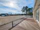 Beautiful deck with white railing overlooking the expansive backyard at 2420 New Bethel Church Rd, Garner, NC 27529