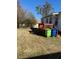 Large backyard with a small porch deck at 305 N State St, Raleigh, NC 27601