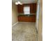 Kitchen with linoleum flooring, wooden cabinets, and a window above the sink at 305 N State St, Raleigh, NC 27601