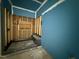 Unfinished bathroom showing an in-progress shower with blue walls at 436 Oakland Dr, Raleigh, NC 27609