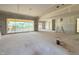 Large living area with sliding glass doors leading to a porch, ready to become the heart of your home at 436 Oakland Dr, Raleigh, NC 27609