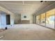 Bright living area with sliding glass doors leading to a porch, offering a spacious and open layout at 436 Oakland Dr, Raleigh, NC 27609