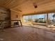 Enclosed patio under construction with a wood-paneled ceiling and view of the landscaped backyard at 436 Oakland Dr, Raleigh, NC 27609