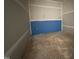 Room with bare walls, taped seams, blue paint, and electrical wiring at 436 Oakland Dr, Raleigh, NC 27609