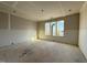 Unfinished room showing a large window allowing natural light at 436 Oakland Dr, Raleigh, NC 27609