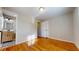 This bedroom features hardwood floors, neutral paint, and a spacious closet at 4383 Deep River Rd, Sanford, NC 27330