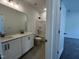 Bathroom with dual sink vanity and combined tub/shower at 4404 Emeline Way # 35, Fuquay Varina, NC 27526