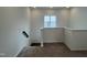 Cozy loft space with plush carpeting and a bright window, perfect for a reading nook at 4404 Emeline Way # 35, Fuquay Varina, NC 27526