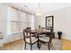 Bright dining area with a round table, natural light, and a stylish rug at 4511 Crab Creek Dr # 201, Raleigh, NC 27612