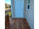This home features a wooden front porch and beige siding at 5520 Neuse View Dr, Raleigh, NC 27610