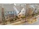 Inviting home with well-maintained lawn, beautiful landscaping, and a charming curb appeal at 5618 Wade Park Blvd, Raleigh, NC 27607